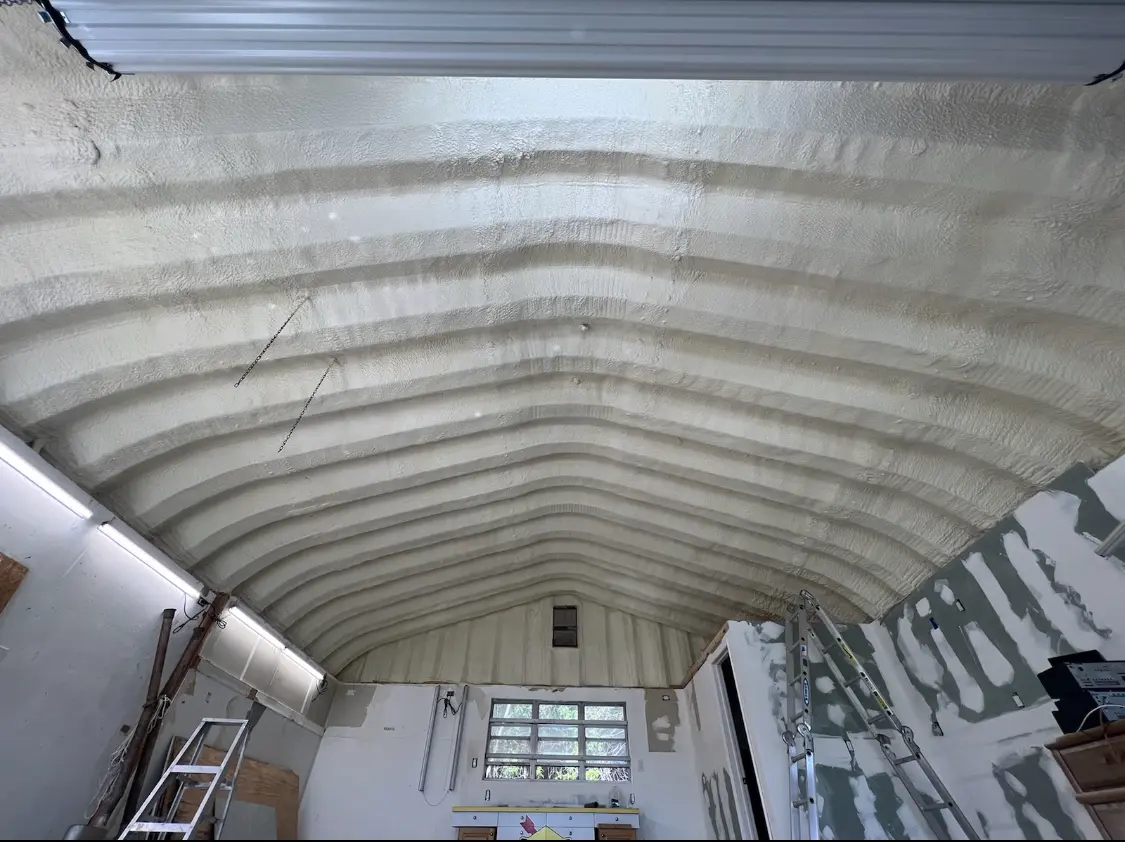 Spray polyurethane foam applied to the underside of a metal roof deck in Watsonville